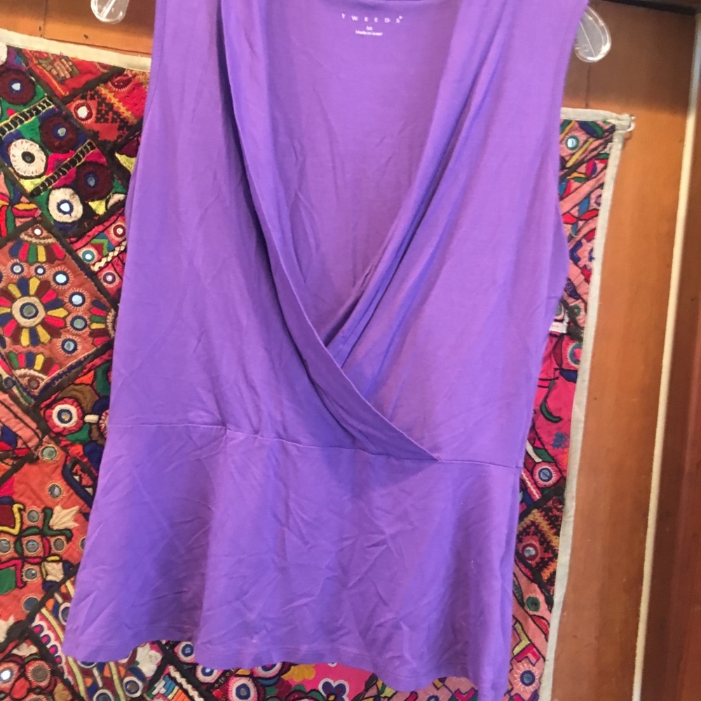 Tweeds sleeveless top.